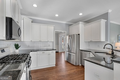 Nestled in the highly sought-after Brookstone Country Club on Brookstone Golf and Country Club in Georgia - for sale on GolfHomes.com, golf home, golf lot