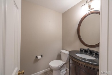 This stunning 2-story home offers 4 bedrooms, 2 full baths, and on Oak Meadow Country Club in Missouri - for sale on GolfHomes.com, golf home, golf lot