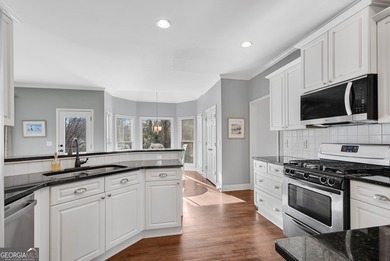 Nestled in the highly sought-after Brookstone Country Club on Brookstone Golf and Country Club in Georgia - for sale on GolfHomes.com, golf home, golf lot