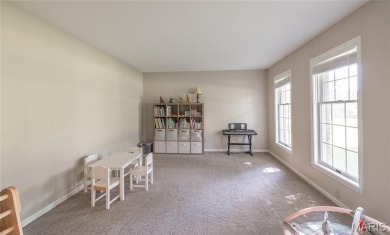 This stunning 2-story home offers 4 bedrooms, 2 full baths, and on Oak Meadow Country Club in Missouri - for sale on GolfHomes.com, golf home, golf lot