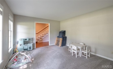 This stunning 2-story home offers 4 bedrooms, 2 full baths, and on Oak Meadow Country Club in Missouri - for sale on GolfHomes.com, golf home, golf lot