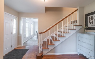 This stunning 2-story home offers 4 bedrooms, 2 full baths, and on Oak Meadow Country Club in Missouri - for sale on GolfHomes.com, golf home, golf lot