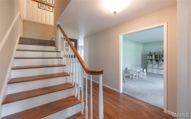 This stunning 2-story home offers 4 bedrooms, 2 full baths, and on Oak Meadow Country Club in Missouri - for sale on GolfHomes.com, golf home, golf lot