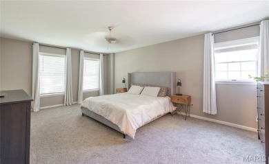 This stunning 2-story home offers 4 bedrooms, 2 full baths, and on Oak Meadow Country Club in Missouri - for sale on GolfHomes.com, golf home, golf lot