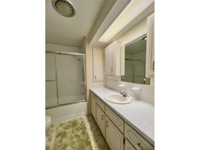 Welcome Home to Comfort, Community, and Connection. Tucked into on Fairway Village Golf Course in Florida - for sale on GolfHomes.com, golf home, golf lot