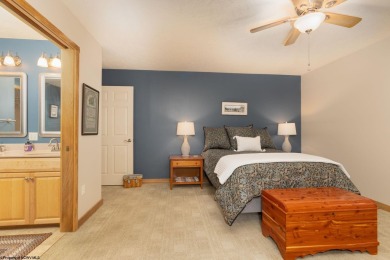Welcome to Whispering Woods, a stunning ranch-style home nestled on Alpine Lake Resort in West Virginia - for sale on GolfHomes.com, golf home, golf lot