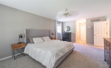 This stunning 2-story home offers 4 bedrooms, 2 full baths, and on Oak Meadow Country Club in Missouri - for sale on GolfHomes.com, golf home, golf lot