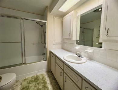 Welcome Home to Comfort, Community, and Connection. Tucked into on Fairway Village Golf Course in Florida - for sale on GolfHomes.com, golf home, golf lot