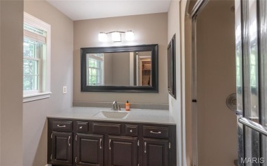 This stunning 2-story home offers 4 bedrooms, 2 full baths, and on Oak Meadow Country Club in Missouri - for sale on GolfHomes.com, golf home, golf lot