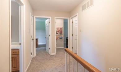 This stunning 2-story home offers 4 bedrooms, 2 full baths, and on Oak Meadow Country Club in Missouri - for sale on GolfHomes.com, golf home, golf lot