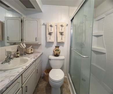 Welcome Home to Comfort, Community, and Connection. Tucked into on Fairway Village Golf Course in Florida - for sale on GolfHomes.com, golf home, golf lot