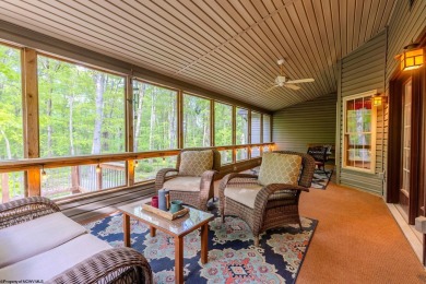 Welcome to Whispering Woods, a stunning ranch-style home nestled on Alpine Lake Resort in West Virginia - for sale on GolfHomes.com, golf home, golf lot