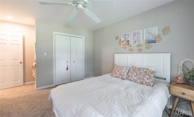 This stunning 2-story home offers 4 bedrooms, 2 full baths, and on Oak Meadow Country Club in Missouri - for sale on GolfHomes.com, golf home, golf lot