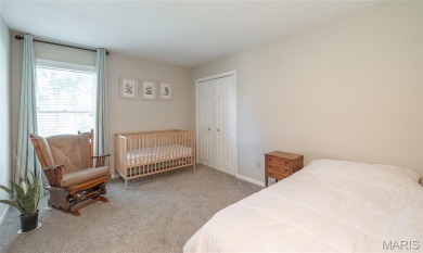 This stunning 2-story home offers 4 bedrooms, 2 full baths, and on Oak Meadow Country Club in Missouri - for sale on GolfHomes.com, golf home, golf lot