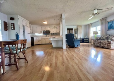 Welcome Home to Comfort, Community, and Connection. Tucked into on Fairway Village Golf Course in Florida - for sale on GolfHomes.com, golf home, golf lot