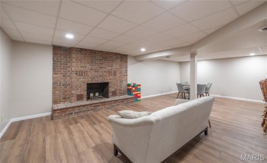 This stunning 2-story home offers 4 bedrooms, 2 full baths, and on Oak Meadow Country Club in Missouri - for sale on GolfHomes.com, golf home, golf lot