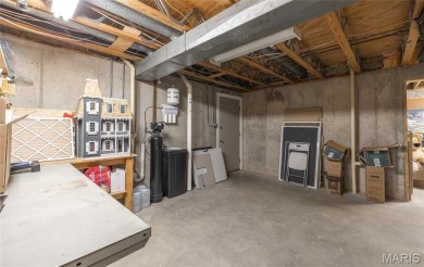 This stunning 2-story home offers 4 bedrooms, 2 full baths, and on Oak Meadow Country Club in Missouri - for sale on GolfHomes.com, golf home, golf lot