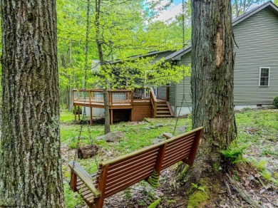 Welcome to Whispering Woods, a stunning ranch-style home nestled on Alpine Lake Resort in West Virginia - for sale on GolfHomes.com, golf home, golf lot