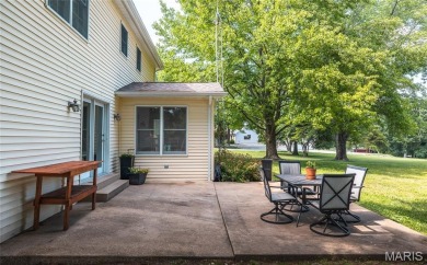 This stunning 2-story home offers 4 bedrooms, 2 full baths, and on Oak Meadow Country Club in Missouri - for sale on GolfHomes.com, golf home, golf lot