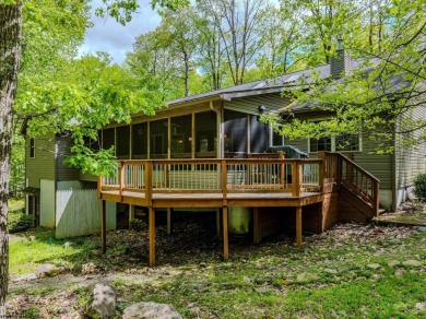 Welcome to Whispering Woods, a stunning ranch-style home nestled on Alpine Lake Resort in West Virginia - for sale on GolfHomes.com, golf home, golf lot
