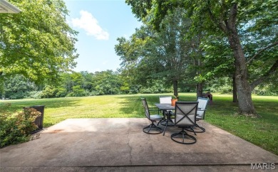 This stunning 2-story home offers 4 bedrooms, 2 full baths, and on Oak Meadow Country Club in Missouri - for sale on GolfHomes.com, golf home, golf lot