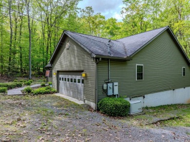 Welcome to Whispering Woods, a stunning ranch-style home nestled on Alpine Lake Resort in West Virginia - for sale on GolfHomes.com, golf home, golf lot