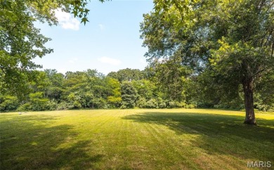 This stunning 2-story home offers 4 bedrooms, 2 full baths, and on Oak Meadow Country Club in Missouri - for sale on GolfHomes.com, golf home, golf lot