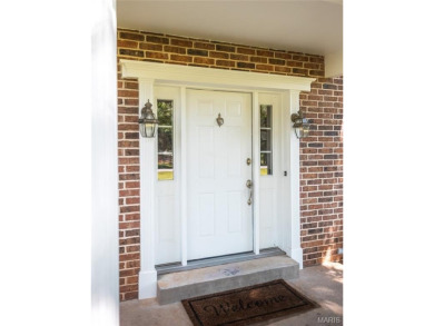 This stunning 2-story home offers 4 bedrooms, 2 full baths, and on Oak Meadow Country Club in Missouri - for sale on GolfHomes.com, golf home, golf lot