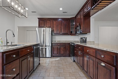 Stunning, move-in ready home in the heart of Gulf Hills -- one on Gulf Hills Golf Club in Mississippi - for sale on GolfHomes.com, golf home, golf lot