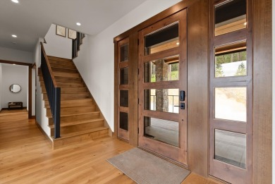 Escape to 12.5 acres of ski mountain privacy and Whitefish Lake on Iron Horse Golf Club in Montana - for sale on GolfHomes.com, golf home, golf lot