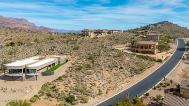 Experience sweeping, elevated views of the iconic Superstition on Gold Canyon Golf Resort - Sidewinder in Arizona - for sale on GolfHomes.com, golf home, golf lot