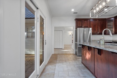 Stunning, move-in ready home in the heart of Gulf Hills -- one on Gulf Hills Golf Club in Mississippi - for sale on GolfHomes.com, golf home, golf lot