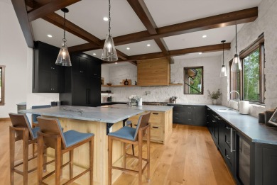 Escape to 12.5 acres of ski mountain privacy and Whitefish Lake on Iron Horse Golf Club in Montana - for sale on GolfHomes.com, golf home, golf lot