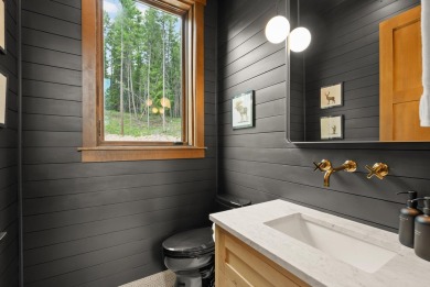 Escape to 12.5 acres of ski mountain privacy and Whitefish Lake on Iron Horse Golf Club in Montana - for sale on GolfHomes.com, golf home, golf lot