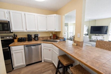 Ideally located in Sandpiper Cove, this amenity-rich complex on Sandpiper Cove Golf Course in Florida - for sale on GolfHomes.com, golf home, golf lot