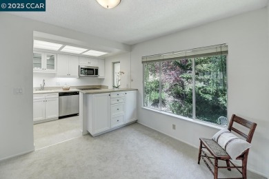 Delightful Del Monte Rossmoor Model! An upper unit with carport on Rossmoor Golf Course in California - for sale on GolfHomes.com, golf home, golf lot