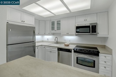 Delightful Del Monte Rossmoor Model! An upper unit with carport on Rossmoor Golf Course in California - for sale on GolfHomes.com, golf home, golf lot