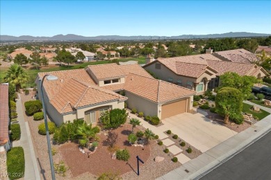Belmont model with plantation shutters throughout the house on Highland Falls Golf Club in Nevada - for sale on GolfHomes.com, golf home, golf lot