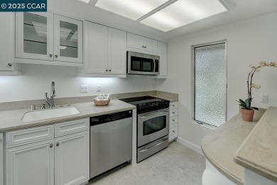 Delightful Del Monte Rossmoor Model! An upper unit with carport on Rossmoor Golf Course in California - for sale on GolfHomes.com, golf home, golf lot