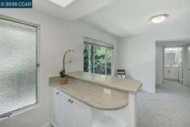 Delightful Del Monte Rossmoor Model! An upper unit with carport on Rossmoor Golf Course in California - for sale on GolfHomes.com, golf home, golf lot