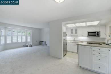 Delightful Del Monte Rossmoor Model! An upper unit with carport on Rossmoor Golf Course in California - for sale on GolfHomes.com, golf home, golf lot