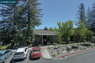 Delightful Del Monte Rossmoor Model! An upper unit with carport on Rossmoor Golf Course in California - for sale on GolfHomes.com, golf home, golf lot