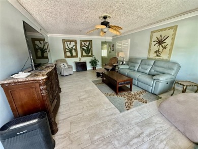 This GROUND FLOOR condo is a true gem with 1,400 sq ft of living on On Top Of The World Golf Course in Florida - for sale on GolfHomes.com, golf home, golf lot