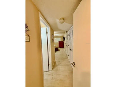 This GROUND FLOOR condo is a true gem with 1,400 sq ft of living on On Top Of The World Golf Course in Florida - for sale on GolfHomes.com, golf home, golf lot