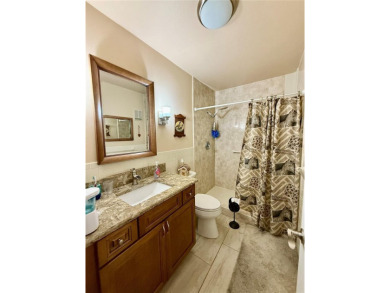 This GROUND FLOOR condo is a true gem with 1,400 sq ft of living on On Top Of The World Golf Course in Florida - for sale on GolfHomes.com, golf home, golf lot