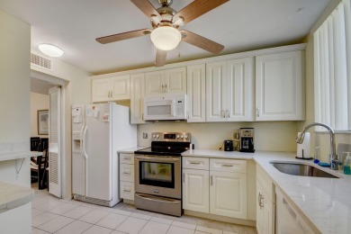 Beautifully maintained 3-bedroom, 3-bath corner unit on the golf on Fountains Golf and Country Club in Florida - for sale on GolfHomes.com, golf home, golf lot