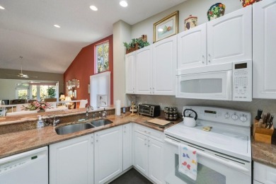 Beautifully UPDATED TURNKEY end unit villa with lots of natural on Palm Aire Country Club of Sarasota in Florida - for sale on GolfHomes.com, golf home, golf lot