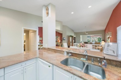 Beautifully UPDATED TURNKEY end unit villa with lots of natural on Palm Aire Country Club of Sarasota in Florida - for sale on GolfHomes.com, golf home, golf lot