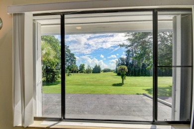 Beautifully maintained 3-bedroom, 3-bath corner unit on the golf on Fountains Golf and Country Club in Florida - for sale on GolfHomes.com, golf home, golf lot