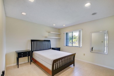 Beautifully maintained 3-bedroom, 3-bath corner unit on the golf on Fountains Golf and Country Club in Florida - for sale on GolfHomes.com, golf home, golf lot